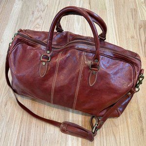 Vintage burgundy leather duffle bag